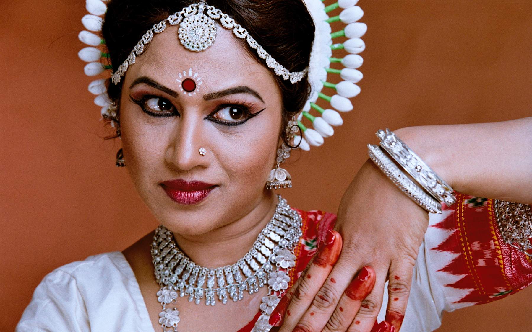 Portrait of Shubhada Varadkar in Odissi costume and headdress.